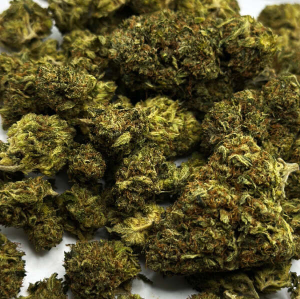 Bubba OG is an indica-dominant hybrid strain with a 20:80 sativa to indica ratio. It has low levels of CBD at about 0.4%, but high levels of THC, ranging from 22% to possibly 25%. This strain is known for its potent body high, which reduces stress, stimulates appetite, and promotes sleep. Bubba OG is useful in treating various conditions, including lack of appetite, chronic pain, insomnia, anxiety, headaches, and depression. Side effects may include dry mouth and red eyes, while other negative effects are rare. The strain has an earthy flavor and a floral aroma. Its origins are not entirely clear, but it is believed to be related to OG Kush and is mainly found in California, Arizona, Colorado, and British Columbia. Though not as sought after as some of its Kush cousins, Bubba OG remains a favorite among many medical users.
