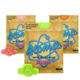Experience the vibrant, delectable world of our Assorted Atomic Wheelchair Minis (800mg). These high-dose cannabis gummies are a fun, flavorful, and potent way to enjoy your cannabis experience. Each 800mg package is comprised of four 200mg Minis, coming in the tantalizing tastes of apricot, green apple, and peach. Crafted with premium organic sugar and organic tapioca syrup, these gelatin chews offer a naturally sweet and satisfying taste. Each bite is further amplified with natural flavors and colors, ensuring a clean, wholesome, and enjoyable edible experience. The natural ingredients complement the high potency THC, creating a well-rounded cannabis experience that's delightful to the palate. Indulge in the juicy apricot, crisp green apple, or luscious peach flavors that make Atomic Wheelchair Minis stand out. The bursting fruity flavors, combined with the potent effects of high-quality cannabis, make these gummies a sought-after choice among seasoned users.