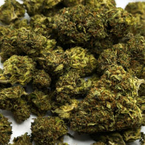 Bubba OG is an indica-dominant hybrid strain with a 20:80 sativa to indica ratio. It has low levels of CBD at about 0.4%, but high levels of THC, ranging from 22% to possibly 25%. This strain is known for its potent body high, which reduces stress, stimulates appetite, and promotes sleep. Bubba OG is useful in treating various conditions, including lack of appetite, chronic pain, insomnia, anxiety, headaches, and depression. Side effects may include dry mouth and red eyes, while other negative effects are rare. The strain has an earthy flavor and a floral aroma. Its origins are not entirely clear, but it is believed to be related to OG Kush and is mainly found in California, Arizona, Colorado, and British Columbia. Though not as sought after as some of its Kush cousins, Bubba OG remains a favorite among many medical users.