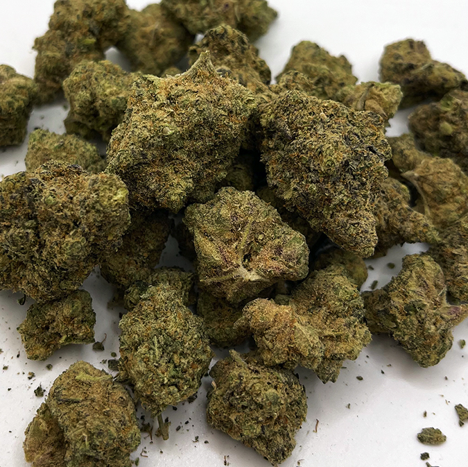 Banana Cream Cake, also known as "Banana Cake," is a sativa-dominant hybrid marijuana strain made by crossing Wedding Cake with Monkey Banana. Banana Cake produces uplifting effects that will leave you in a blissful mood. Consumers say this strain is an ideal choice for your wake and bake session as long as you consume in small doses. Because Banana Cake's THC level hovers around 21%, this strain may be overwhelming to some novice cannabis consumers. This strain features a banana forward flavor profile that will hit you in the nostrils upon opening your stash. The aroma is similar, with a creamy and cool finish on the exhale. Medical marijuana patients choose Banana Cake to relieve symptoms associated with chronic depression, nausea, and pain. According to growers, this strain flowers into dense, light green nugs with tiny orange hairs and a coating of frosty trichomes. Banana Cake was originally bred by Paisa Grow Seeds.